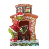 Grinch Pushing Tree Up Fireplace
